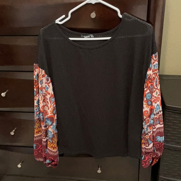 SHEIN Sweaters - This is a cute floral shirt from Shein.